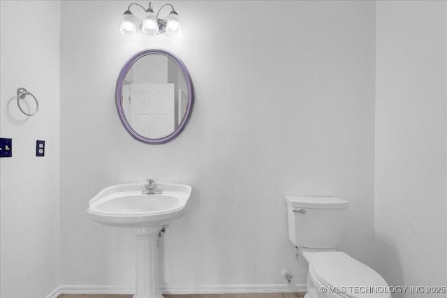 3000 S Tamarack Ave, Broken Arrow, OK 74012 - half bathroom with toilet and baseboards