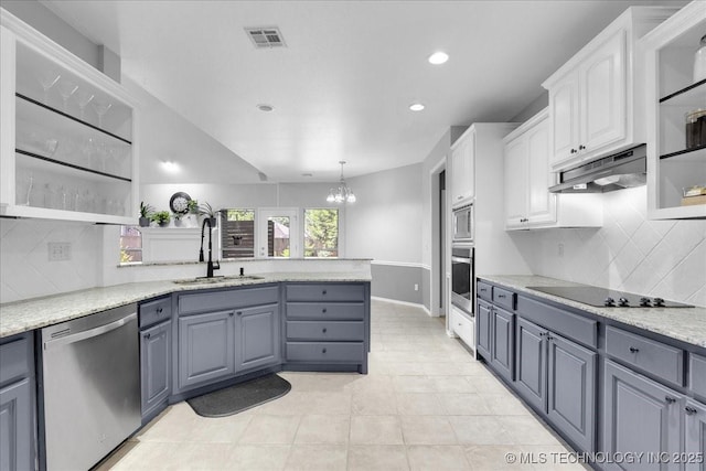 3000 S Tamarack Ave, Broken Arrow, OK 74012 - kitchen featuring stainless steel appliances, a sink, under cabinet range hood, white cabinetry, and a peninsula