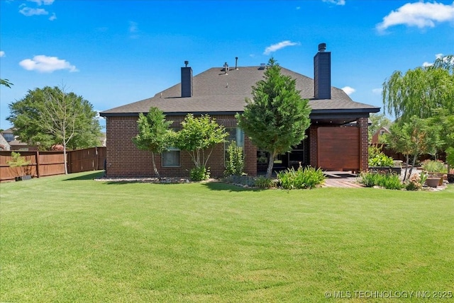 3000 S Tamarack Ave, Broken Arrow, OK 74012 - back of property featuring a chimney, brick siding, and a shingled roof