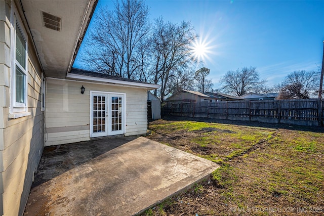 506 W 17th, Sulphur, OK 73086 - fenced backyard featuring a patio area and french doors