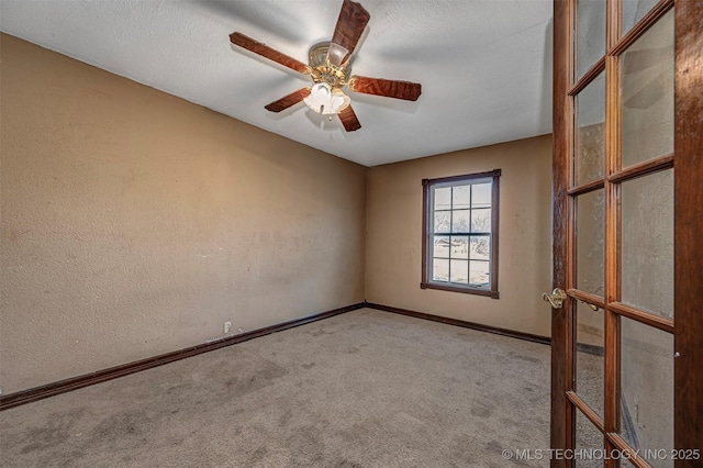 506 W 17th, Sulphur, OK 73086 - spare room featuring carpet floors, baseboards, ceiling fan, and a textured wall