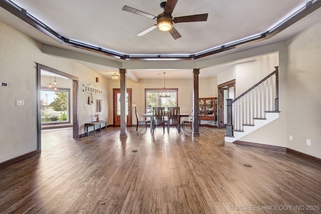 4748 N 4318th Rd, Pryor, OK 74361 - living area with ornate columns, wood finished floors, and ceiling fan