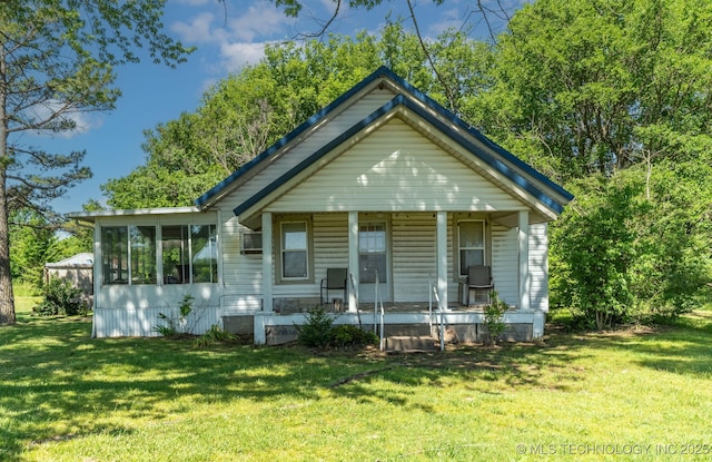 33321 S 4470th Rd, Vinita, OK 74301 - view of front of home featuring covered porch and a front lawn