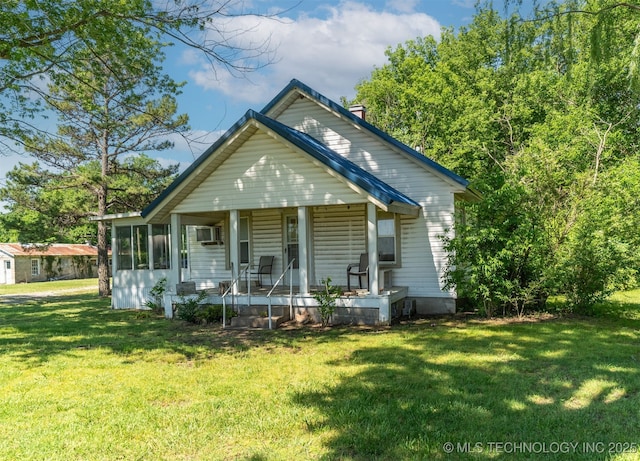 33321 S 4470th Rd, Vinita, OK 74301 - view of front of house with covered porch, a front lawn, and a chimney
