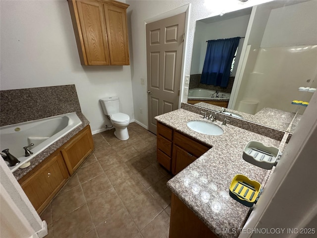 905 Brookside Dr, Durant, OK 74701 - full bath featuring a bath, toilet, tile patterned floors, vanity, and baseboards