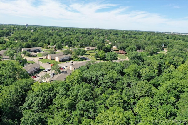 905 Brookside Dr, Durant, OK 74701 - drone / aerial view of a heavily wooded area