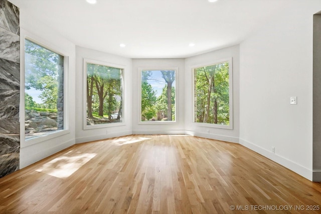 5011 E 84th St, Tulsa, OK 74137 - spare room featuring light wood finished floors, baseboards, and recessed lighting