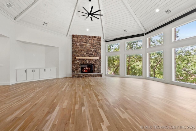 5011 E 84th St, Tulsa, OK 74137 - unfurnished living room with high vaulted ceiling, light wood-type flooring, wood ceiling, healthy amount of natural light, and a fireplace