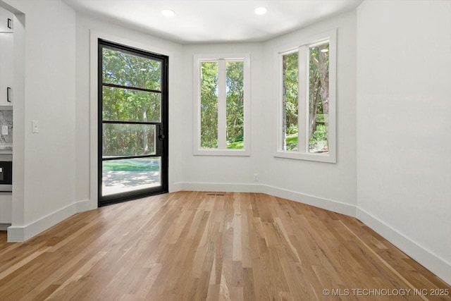 5011 E 84th St, Tulsa, OK 74137 - empty room featuring baseboards, light wood-style flooring, and recessed lighting