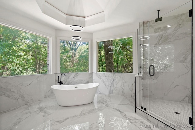 5011 E 84th St, Tulsa, OK 74137 - full bathroom featuring a marble finish shower, a freestanding bath, and marble tiled floors