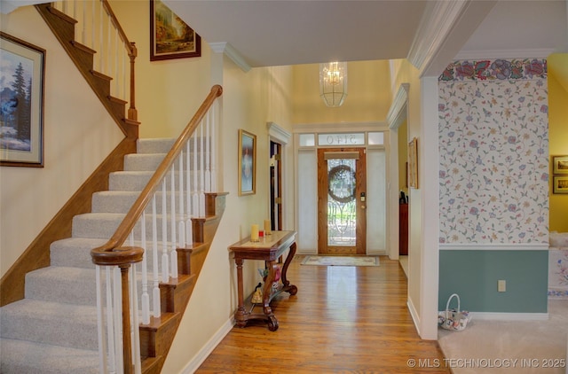 5140 E 107th Pl, Tulsa, OK 74137 - foyer entrance featuring stairway, wood finished floors, ornamental molding, baseboards, and a chandelier