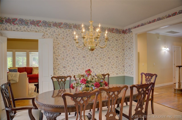 5140 E 107th Pl, Tulsa, OK 74137 - dining area featuring a chandelier, ornamental molding, wood finished floors, wallpapered walls, and baseboards
