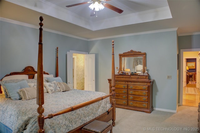 5140 E 107th Pl, Tulsa, OK 74137 - bedroom featuring light colored carpet, crown molding, a ceiling fan, and a raised ceiling