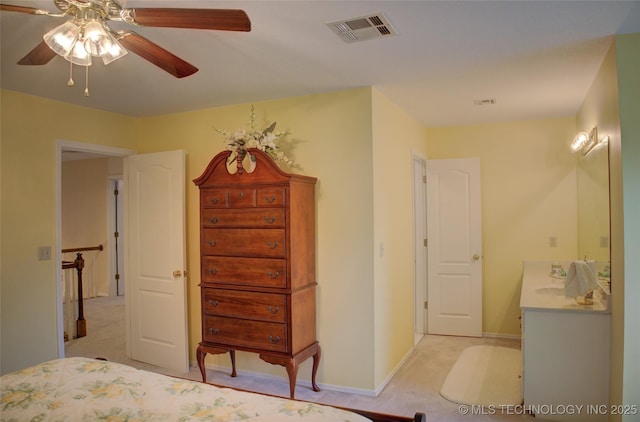 5140 E 107th Pl, Tulsa, OK 74137 - bedroom with light colored carpet, baseboards, and a ceiling fan