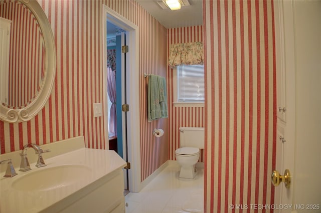 5140 E 107th Pl, Tulsa, OK 74137 - bathroom with wallpapered walls, toilet, vanity, and tile patterned flooring