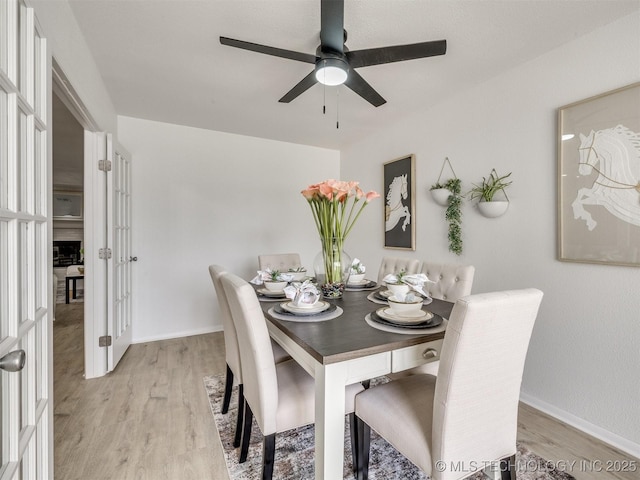 5015 S 89th E Pl, Tulsa, OK 74145 - dining area featuring a ceiling fan and light wood finished floors