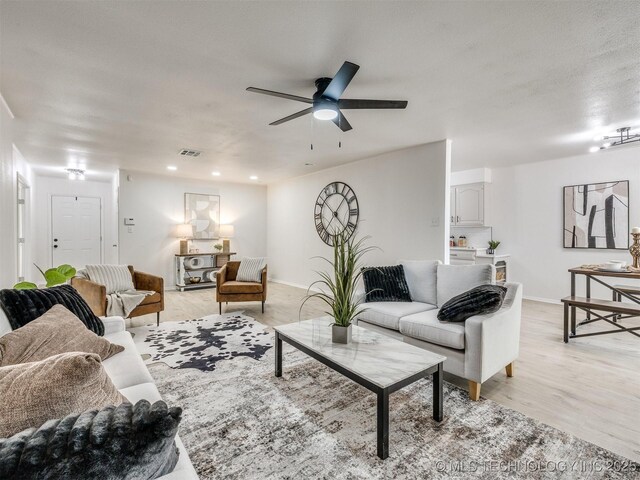 5015 S 89th E Pl, Tulsa, OK 74145 - living room with a ceiling fan, light wood-style floors, and recessed lighting