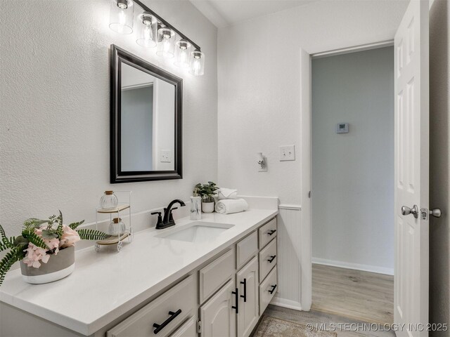5015 S 89th E Pl, Tulsa, OK 74145 - bathroom featuring vanity and wood finished floors