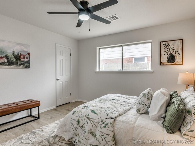 5015 S 89th E Pl, Tulsa, OK 74145 - bedroom featuring wood finished floors and ceiling fan