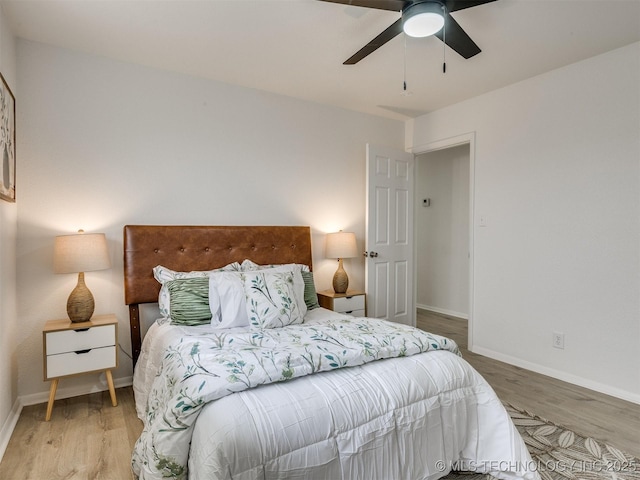 5015 S 89th E Pl, Tulsa, OK 74145 - bedroom featuring wood finished floors and a ceiling fan