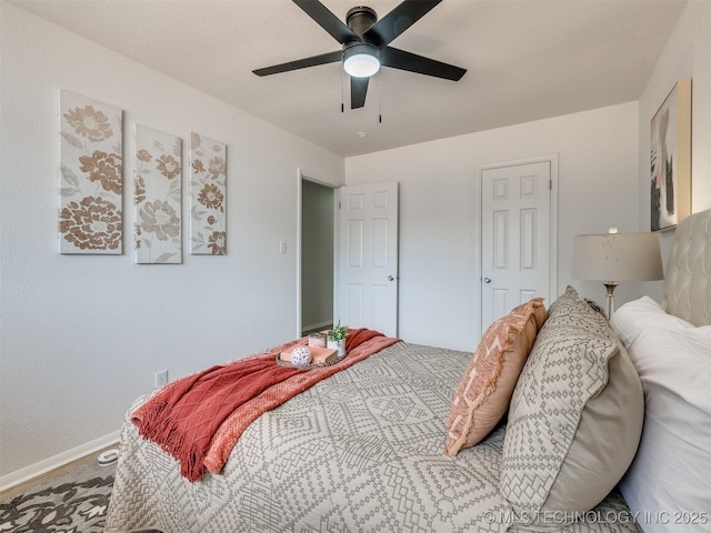5015 S 89th E Pl, Tulsa, OK 74145 - carpeted bedroom with baseboards and a ceiling fan