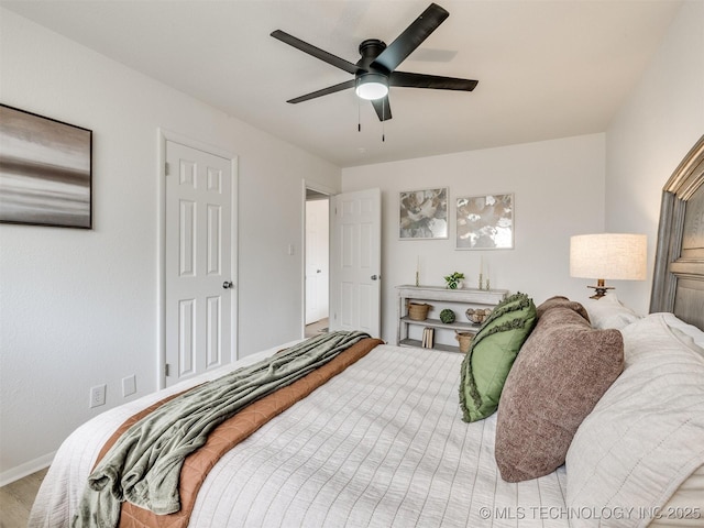 5015 S 89th E Pl, Tulsa, OK 74145 - bedroom with ceiling fan and wood finished floors