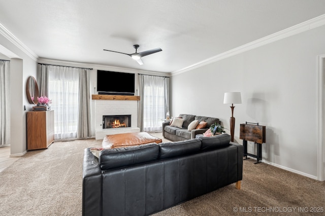 3305 N Oak Ave, Broken Arrow, OK 74012 - living room featuring carpet floors, crown molding, plenty of natural light, and ceiling fan