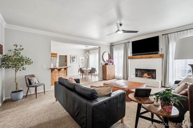 3305 N Oak Ave, Broken Arrow, OK 74012 - living room with ornamental molding, a brick fireplace, ceiling fan, and light colored carpet
