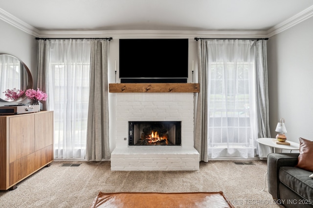 3305 N Oak Ave, Broken Arrow, OK 74012 - living area with crown molding, a brick fireplace, and carpet flooring