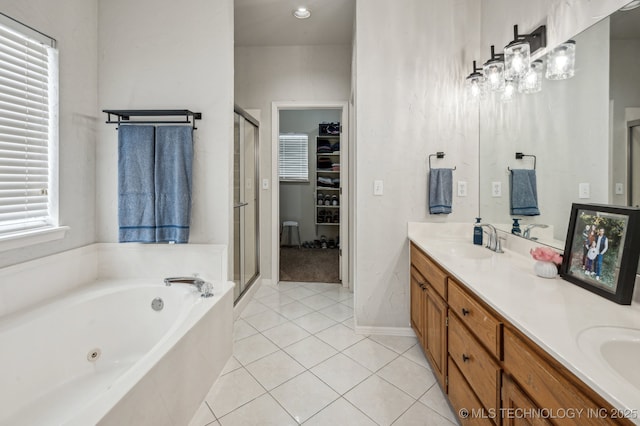 3305 N Oak Ave, Broken Arrow, OK 74012 - bathroom with double vanity, a stall shower, a tub with jets, and tile patterned flooring