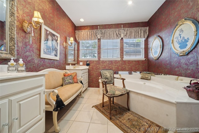 2403 S Troost Ave, Tulsa, OK 74114 - full bathroom with wallpapered walls, a bath, tile patterned floors, vanity, and baseboards