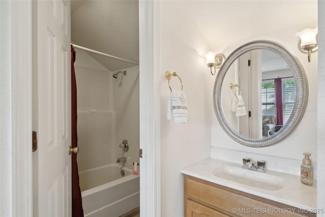 2403 S Troost Ave, Tulsa, OK 74114 - bathroom with bathing tub / shower combination, vanity, and vaulted ceiling