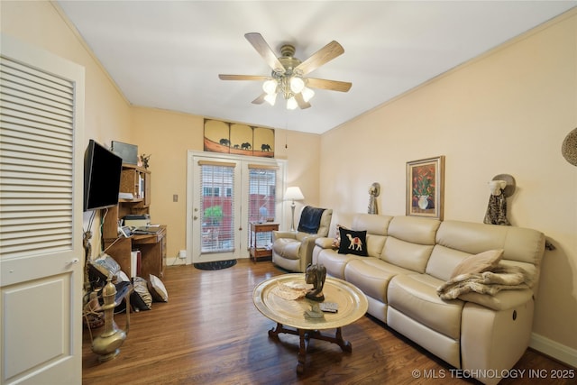 2403 S Troost Ave, Tulsa, OK 74114 - living area featuring a ceiling fan, wood finished floors, and baseboards