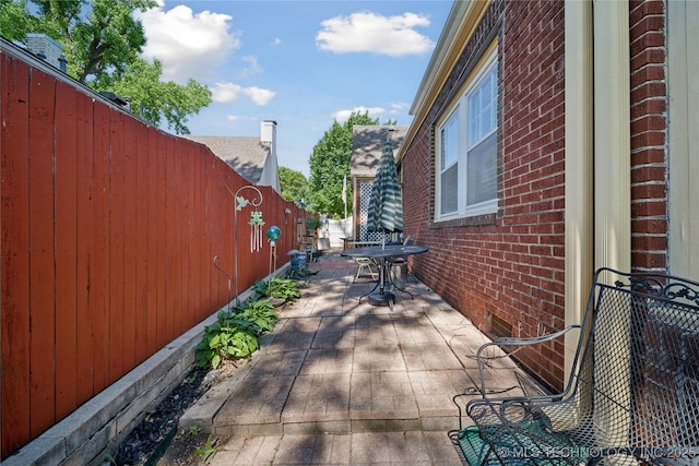 2403 S Troost Ave, Tulsa, OK 74114 - view of patio / terrace with outdoor dining space
