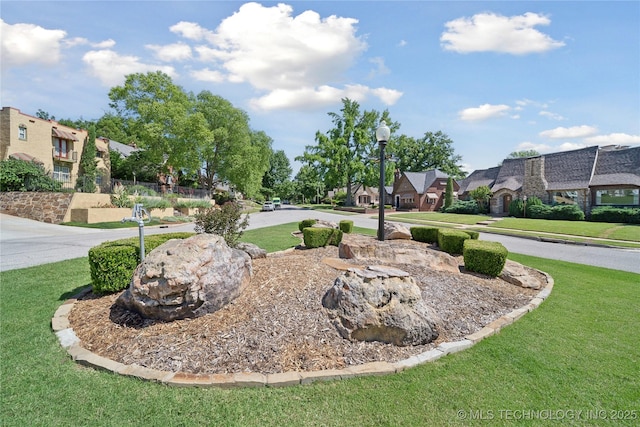 2403 S Troost Ave, Tulsa, OK 74114 - view of grassy yard featuring a residential view