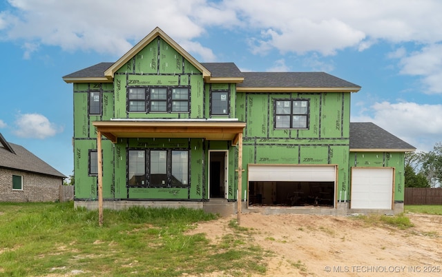9518 N 143rd Ct E, Owasso, OK 74055 - property under construction featuring a shingled roof and driveway