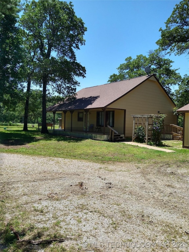 10670 S 4200th Rd S, Claremore, OK 74017 - view of front of home featuring covered porch and a front yard