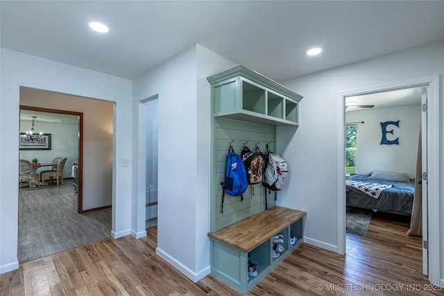11787 S 4243rd Rd, Chelsea, OK 74016 - mudroom featuring a chandelier, wood finished floors, baseboards, and recessed lighting