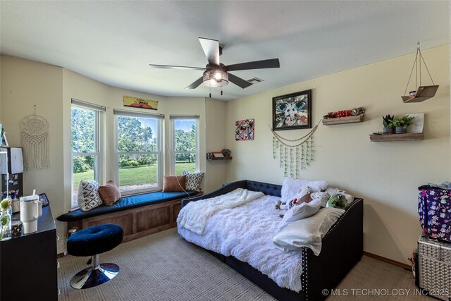 11787 S 4243rd Rd, Chelsea, OK 74016 - bedroom with carpet floors, a ceiling fan, and baseboards