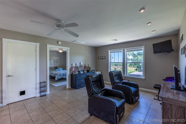 11787 S 4243rd Rd, Chelsea, OK 74016 - living area featuring a ceiling fan, light tile patterned floors, and baseboards