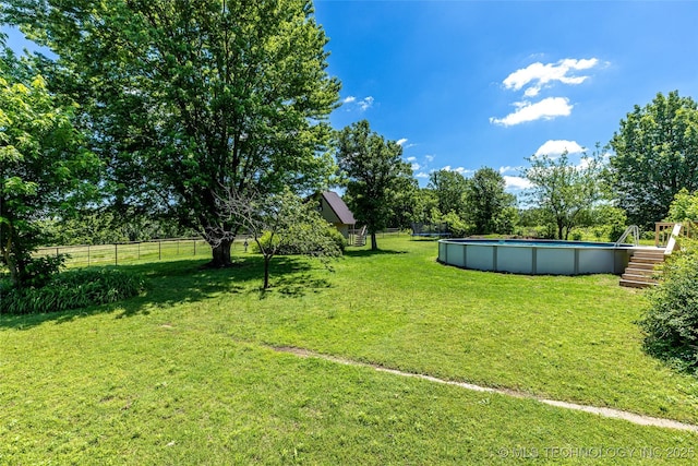 11787 S 4243rd Rd, Chelsea, OK 74016 - view of yard with an outdoor pool