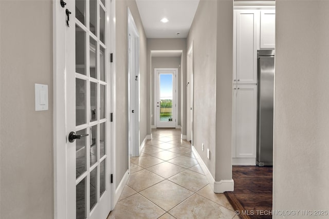 12014 S Kingston Pl, Tulsa, OK 74137 - hall with light tile patterned floors, french doors, baseboards, and recessed lighting