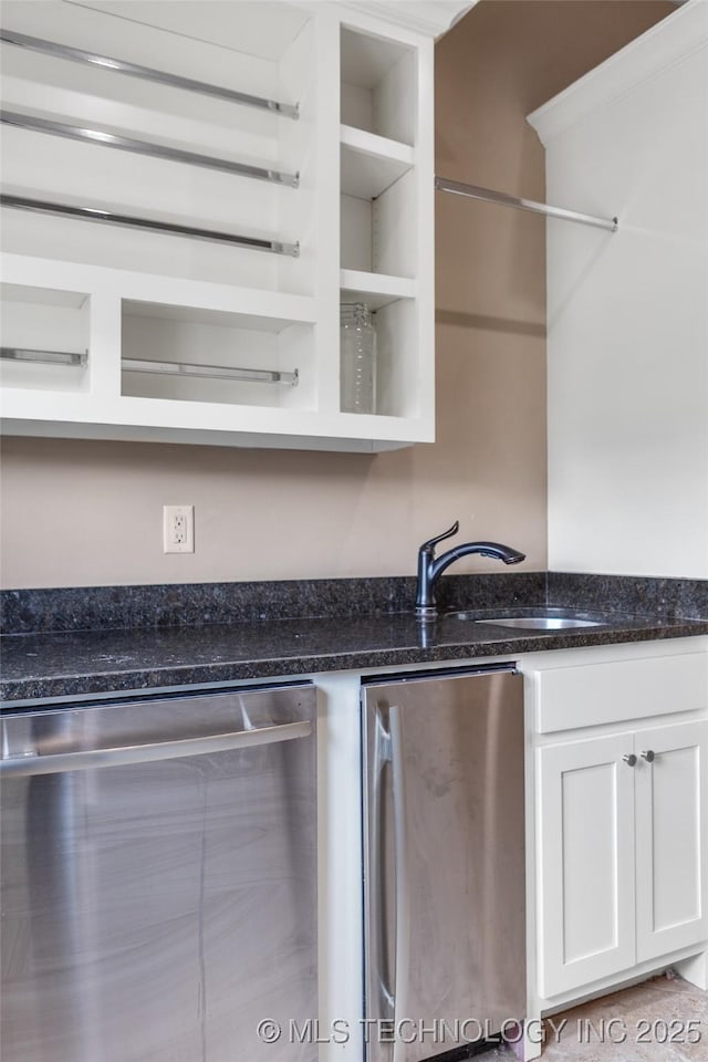 12014 S Kingston Pl, Tulsa, OK 74137 - kitchen with stainless steel appliances, a sink, white cabinetry, dark stone counters, and open shelves