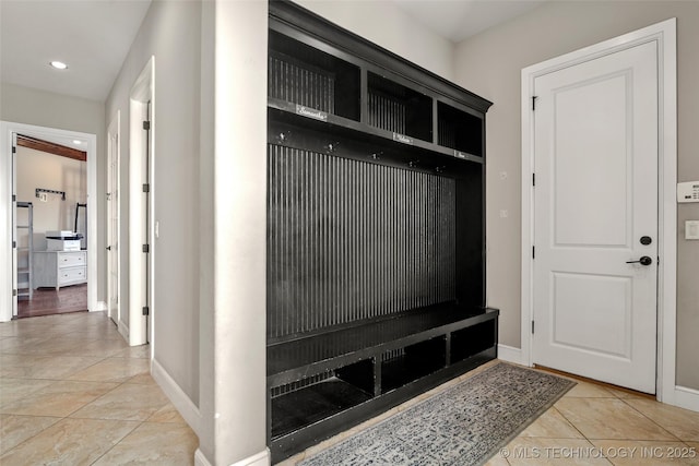 12014 S Kingston Pl, Tulsa, OK 74137 - mudroom featuring light tile patterned floors and recessed lighting