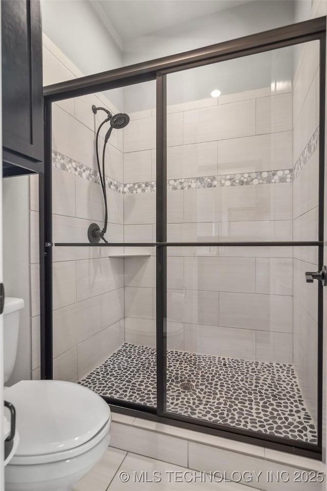 12014 S Kingston Pl, Tulsa, OK 74137 - full bathroom featuring a shower stall and tile patterned flooring