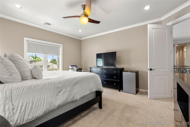 12014 S Kingston Pl, Tulsa, OK 74137 - bedroom with recessed lighting, crown molding, light colored carpet, freestanding refrigerator, and baseboards