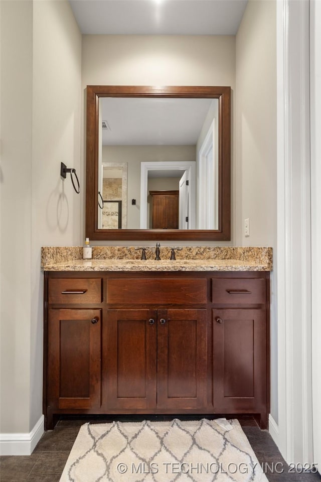 12014 S Kingston Pl, Tulsa, OK 74137 - bathroom featuring vanity and baseboards