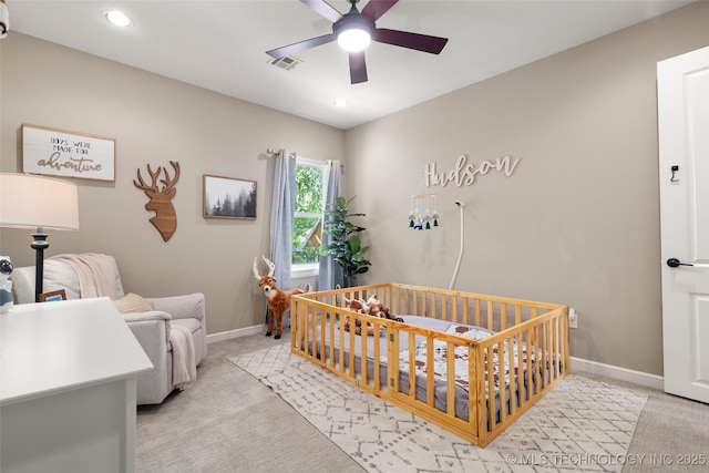12014 S Kingston Pl, Tulsa, OK 74137 - bedroom featuring a nursery area, light carpet, baseboards, a ceiling fan, and recessed lighting
