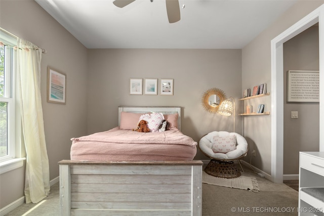 12014 S Kingston Pl, Tulsa, OK 74137 - bedroom with carpet flooring and a ceiling fan