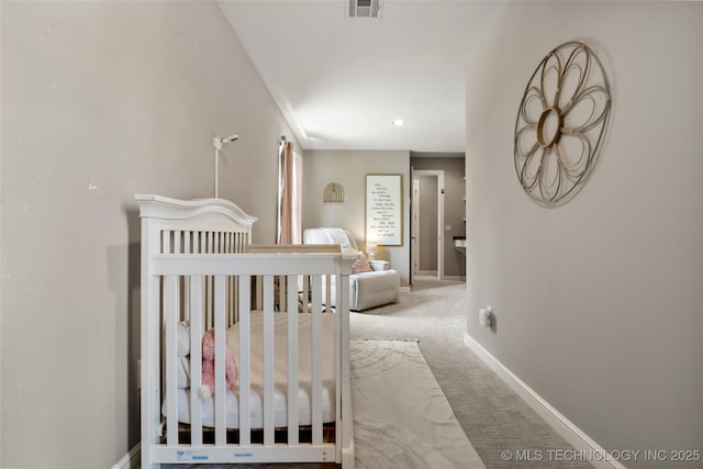 12014 S Kingston Pl, Tulsa, OK 74137 - carpeted bedroom featuring baseboards and a crib